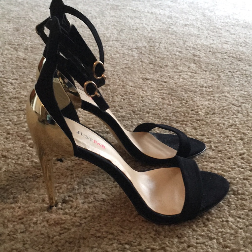 Black and gold stilettos